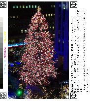 Rockefeller Center's Christmas tree illuminated